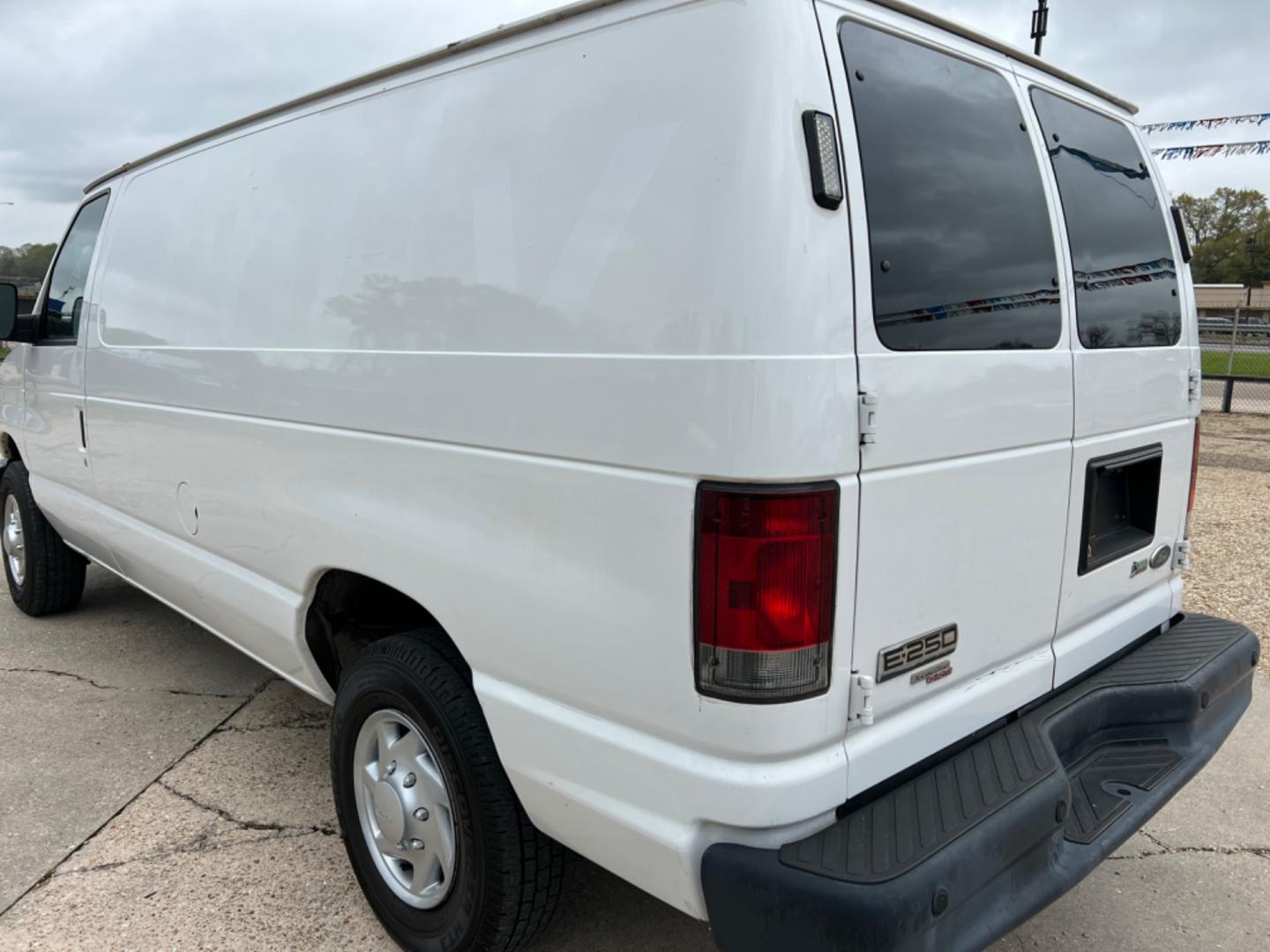 2012 White /Gray Ford E-Series Van (1FTNE2EL7CD) with an 5.4 V8 engine, Automatic transmission, located at 4520 Airline Hwy, Baton Rouge, LA, 70805, (225) 357-1497, 30.509325, -91.145432 - 2012 Ford E-250 Cargo Van 5.4 V8 Gas, 156K Miles, Power Windows & Locks, Shelves For Tools Or Parts. NO IN HOUSE FINANCING. FOR INFO PLEASE CONTACT JEFF AT 225 357-1497 CHECK OUT OUR A+ RATING WITH THE BETTER BUSINESS BUREAU WE HAVE BEEN A FAMILY OWNED AND OPERATED BUSINESS AT THE SAME LOCATION FOR - Photo#7